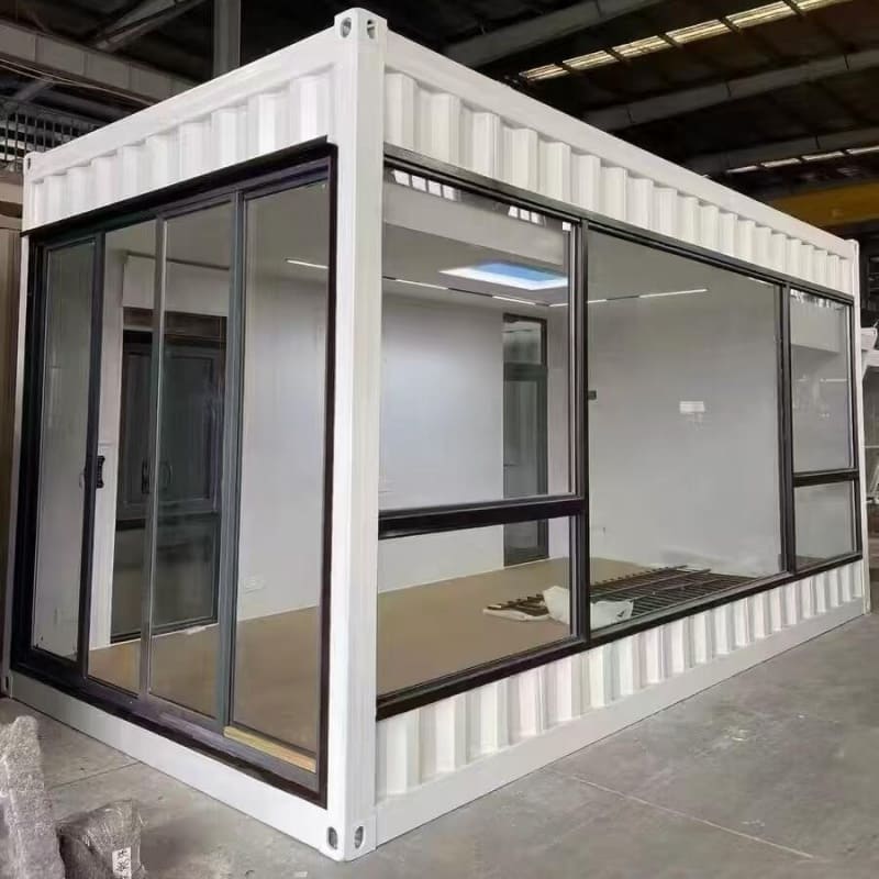 Trendy container bar made from recycled shipping containers, featuring vibrant lighting and an open-air design.