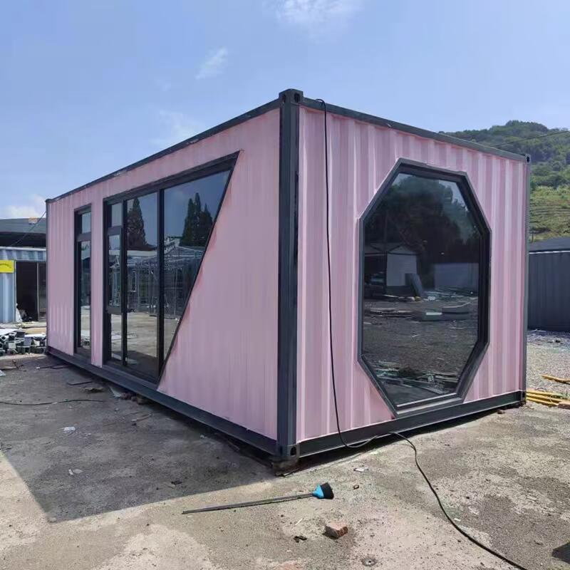 Modern container restaurant built from repurposed shipping containers, featuring outdoor seating and industrial design.