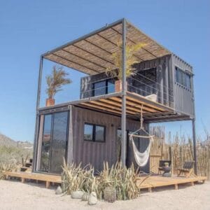 Compact container tiny house with minimalist design and sustainable modular construction.