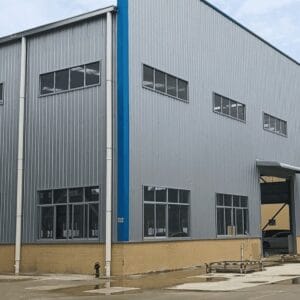 Single-story steel structure factory building with wide span, durable prefab design, and cost-effective solution for industrial production and workshops.