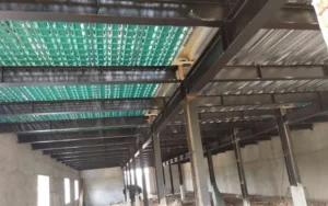 Modern steel structure pig house with ventilation system and durable roof design for large-scale pig farming.