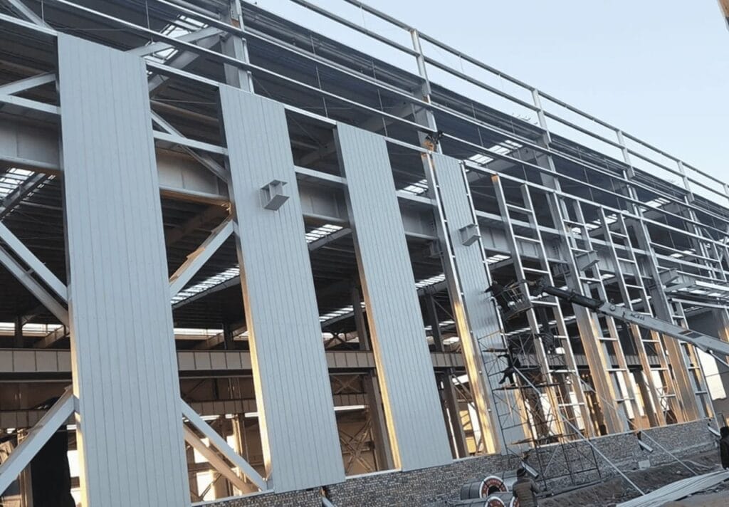 Modern steel structure factory building with durable prefab design, large span workshop space, and cost-effective solution for industrial projects.