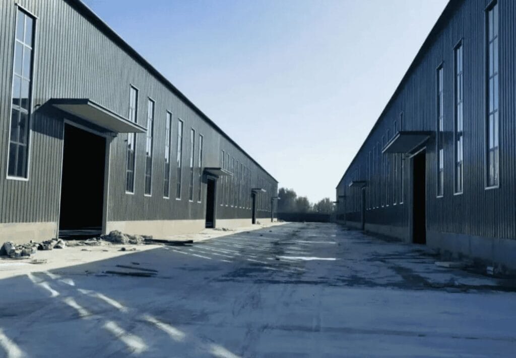 Modern steel structure factory building with durable prefab design, large span workshop space, and cost-effective solution for industrial projects.