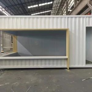 Modern shipping container coffee shop with stylish design, outdoor seating, and eco-friendly architecture, perfect for urban café businesses.