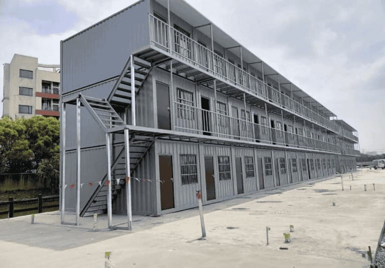 Modular container barracks with durable steel construction, designed for military, emergency, and temporary housing applications